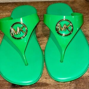 Michael Kors Green Flip Flops with Gold Emblem